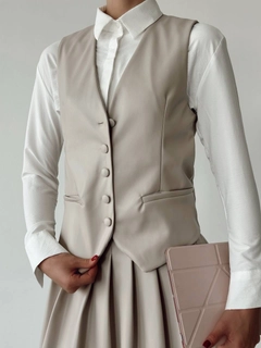 A wholesale clothing model wears qes10011-leather-vest-stone, Turkish wholesale Vest of Qesto Fashion