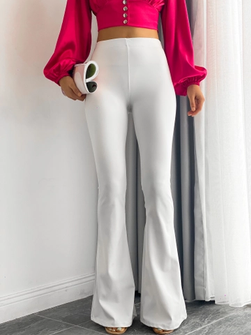 A wholesale clothing model wears  White Diving Fabric Flared Leg Trousers
, Turkish wholesale Pants of Radica Fashion