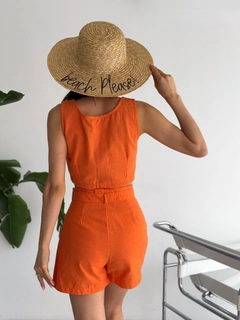 A wholesale clothing model wears raf10048-orange-linen-vest-and-shorts-set, Turkish wholesale Suit of Radica Fashion