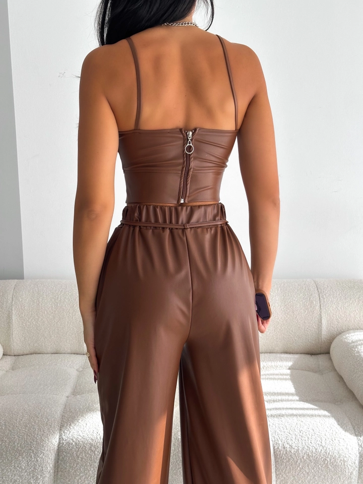 A wholesale clothing model wears raf10021-brown-buckle-detailed-leather-crop, Turkish wholesale Crop Top of Radica Fashion
