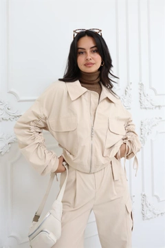 A wholesale clothing model wears rey11090-elastic-waist--gathered-sleeve-bomber-jacket-stone, Turkish wholesale Jacket of Reyon