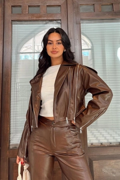 A wholesale clothing model wears rey11484-distressed-look-faux-leather-jacket-brown, Turkish wholesale Jacket of Reyon
