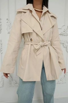 A wholesale clothing model wears rey11499-belted-button-detail-trench-coat-stone, Turkish wholesale Trenchcoat of Reyon
