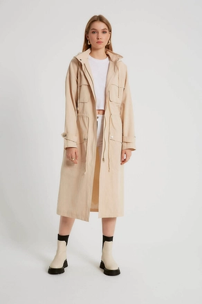 A model wears 3320 - Stone Trenchcoat, wholesale undefined of Robin to display at Lonca
