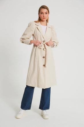 A model wears 3436 - Stone Trenchcoat, wholesale Trenchcoat of Robin to display at Lonca