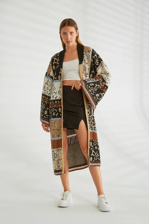 A model wears 21285 - Knitwear Cardigan - Brown And Black, wholesale Cardigan of Robin to display at Lonca