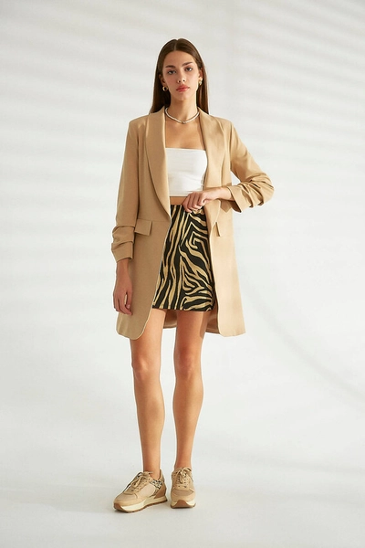 A model wears 30133 - Jacket - Light Camel, wholesale Jacket of Robin to display at Lonca