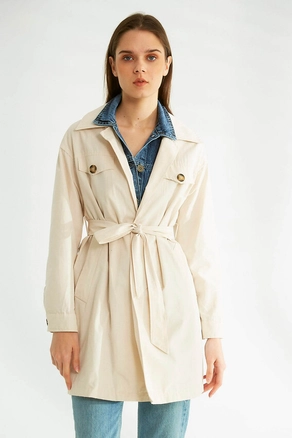 A model wears 32092 - Trenchcoat - Stone, wholesale Trenchcoat of Robin to display at Lonca