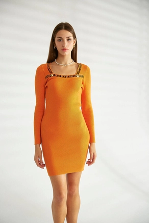 A model wears 32140 - Dress - Orange, wholesale Dress of Robin to display at Lonca