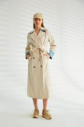 A model wears 44343 - Trench Coat - Stone Color, wholesale Trenchcoat of Robin to display at Lonca