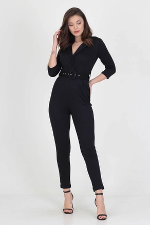 A model wears 34984 - Jumpsuit - Black, wholesale Jumpsuit of Roy Moda to display at Lonca
