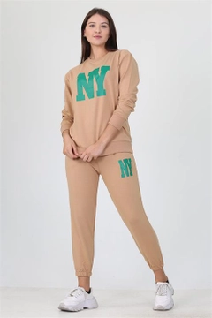 A wholesale clothing model wears 35046 - Tracksuit - Beige, Turkish wholesale Tracksuit of Mode Roy