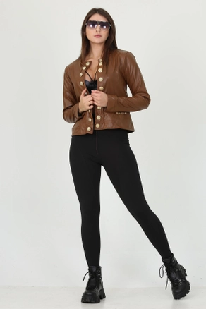 A model wears 35193 - Jacket - Tan, wholesale undefined of Mode Roy to display at Lonca