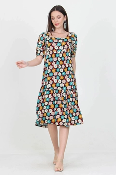 Bir model, Mode Roy toptan giyim markasının 35759 - Mix Color Dress - Turquoise toptan Elbise ürününü sergiliyor.