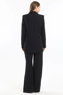 A wholesale clothing model wears sns10861-sense-black-lined-hürrem-fabric-oversize-blazer-jacket, Turkish wholesale Jacket of SENSE