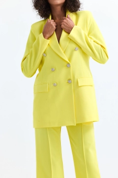 A wholesale clothing model wears sns10932-sense-yellow-women's-suit-jacket-and-trousers, Turkish wholesale Suit of SENSE