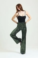 A wholesale clothing model wears sns10952-elastic-wide-leg-sequined-evening-dress-trousers-khaki, Turkish wholesale  of 