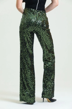 A wholesale clothing model wears sns10952-elastic-wide-leg-sequined-evening-dress-trousers-khaki, Turkish wholesale Pants of SENSE