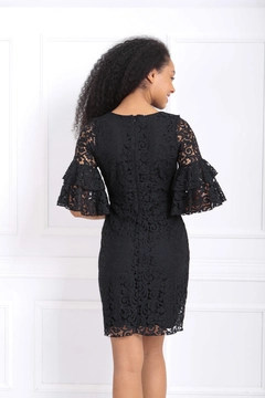 A wholesale clothing model wears sns10974-sense-black-guipure-sleeves-flounce-dress, Turkish wholesale Dress of SENSE
