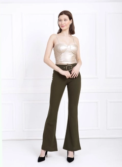 A wholesale clothing model wears sns10015-khaki-spanish-leg-belted-knitted-fabric-trousers-pnt32439, Turkish wholesale Pants of SENSE