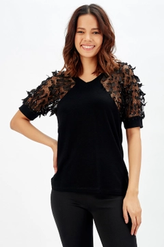 A wholesale clothing model wears sns10151-black-sleeves-bearded-glitter-tulle-viscose-blouse_blz32740, Turkish wholesale Blouse of SENSE