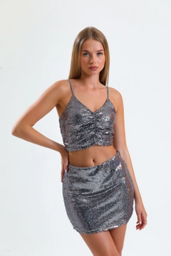 A wholesale clothing model wears sns10254-silver-separated-zippered-sequin-bustiyer_bus32289, Turkish wholesale Bustier of SENSE