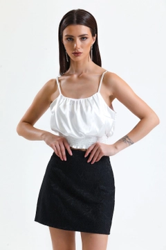 A wholesale clothing model wears sns10284-black-jacquard-mini-skirt_etk32609, Turkish wholesale Skirt of SENSE