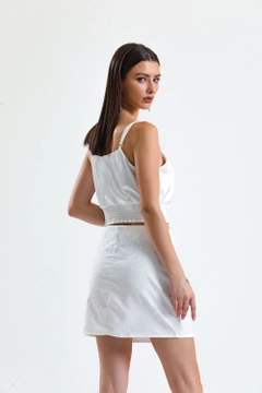 A wholesale clothing model wears sns10364-ecru-jacquard-mini-skirt_etk32609, Turkish wholesale Skirt of SENSE