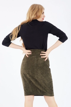 A wholesale clothing model wears sns10369-khaki-hidden-zipper-long-velvet-skirt, Turkish wholesale Skirt of SENSE