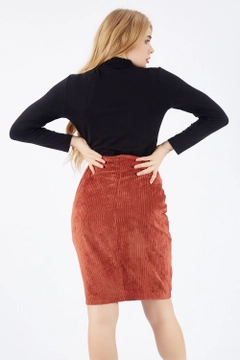 A wholesale clothing model wears sns10303-brick-red-long-velvet-skirt-with-hidden-zipper, Turkish wholesale Skirt of SENSE