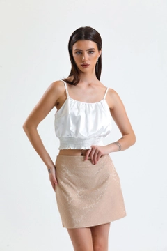 A wholesale clothing model wears sns10315-beige-jacquard-mini-skirt_etk32609, Turkish wholesale Skirt of SENSE