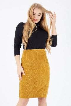 A wholesale clothing model wears sns10463-mustard-hidden-zipper-long-velvet-skirt, Turkish wholesale Skirt of SENSE