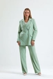 A wholesale clothing model wears sns10576-sense-mold-green-women's-suit-jacket-and-trousers, Turkish wholesale  of 