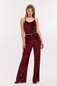 A wholesale clothing model wears sns10510-burgundy-elastic-wide-leg-sequined-evening-dress-trousers, Turkish wholesale Pants of SENSE
