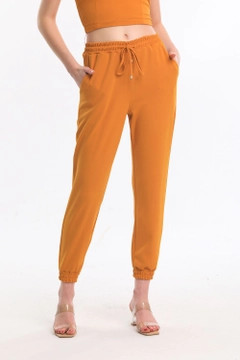 A wholesale clothing model wears sns10640-sense-saffron-pocket-scuba-crepe-trousers-pnt33884, Turkish wholesale Pants of SENSE