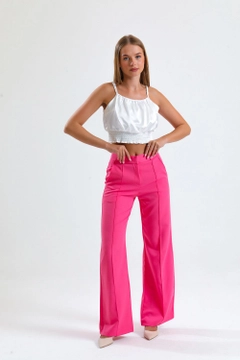 A wholesale clothing model wears sns10655-sense-pink-ornamental-stitched-hürrem-fabric-wide-leg-trousers, Turkish wholesale Pants of SENSE