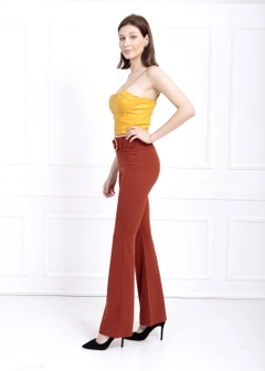 A wholesale clothing model wears sns10668-sense-belted-knitted-fabric-trousers-pnt32439, Turkish wholesale Pants of SENSE