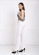 A wholesale clothing model wears sns10687-sense-white-wide-leg-belted-knitted-fabric-trousers-pnt32439, Turkish wholesale  of 
