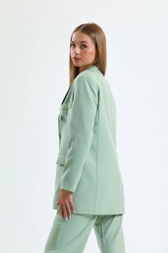 A wholesale clothing model wears sns10692-sense-mold-green-lined-hürrem-fabric-oversize-blazer-jacket, Turkish wholesale Jacket of SENSE