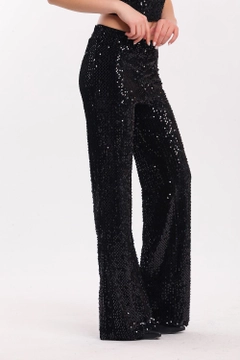 A wholesale clothing model wears sns10612-sense-black-black-elastic-wide-leg-sequined-evening-dress-trousers, Turkish wholesale Pants of SENSE