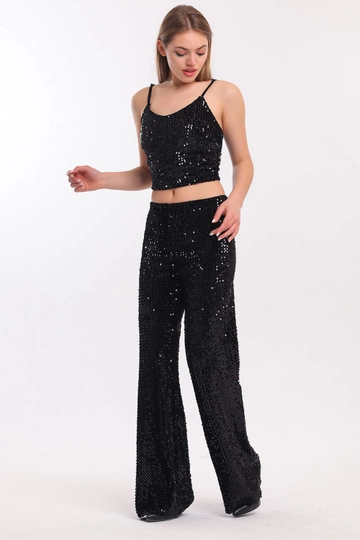 Ein Bekleidungsmodell aus dem Großhandel trägt  Sense – Schwarze  Elastische Abendkleid-Hose Mit Weitem Bein Und Pailletten
, türkischer Großhandel Hose von SENSE