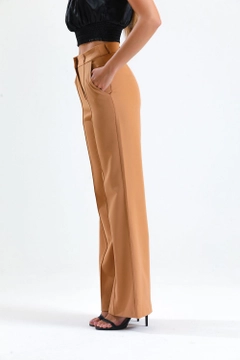 A wholesale clothing model wears sns10722-sense-camel-ornamental-stitched-hürrem-fabric-wide-leg-trousers, Turkish wholesale Pants of SENSE