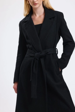 A wholesale clothing model wears sns10854-sense-black-slit-detailed-belted-long-cuff-coat, Turkish wholesale Coat of SENSE