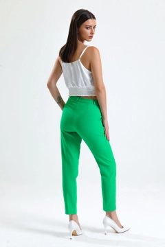 A wholesale clothing model wears sns10838-sense-green-trousers-atlas-fabric-ankle-trousers, Turkish wholesale Pants of SENSE