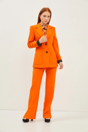 A model wears 28985 - Suit - Orange, wholesale Suit of Setre to display at Lonca