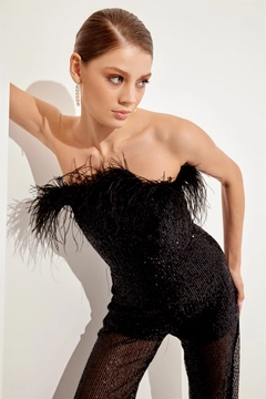 Bir model, Setre toptan giyim markasının 47226 - Overalls - Black toptan Tulum ürününü sergiliyor.