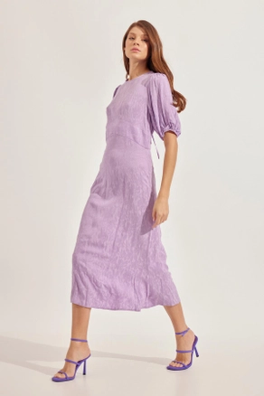 A model wears STR10050 - Dress - Lilac, wholesale Dress of Setre to display at Lonca