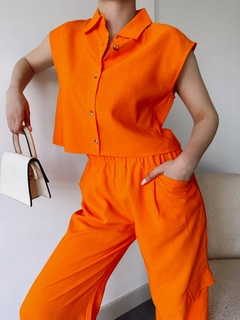 A wholesale clothing model wears SBE10367 - Suit - Orange, Turkish wholesale Suit of Sobe