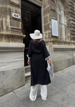 A wholesale clothing model wears sbe11742-muslin-kimono-with-striped-collar-and-sleeves-black, Turkish wholesale Kimono of Sobe