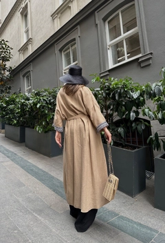 A wholesale clothing model wears sbe11742-muslin-kimono-with-stripes-on-collar-and-sleeves-beige, Turkish wholesale Kimono of Sobe